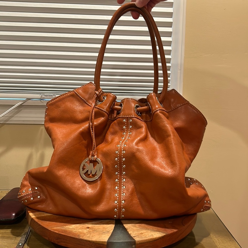 Authentic Michael Kors studded bag beautiful details fully lined stunning color